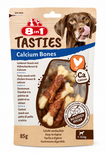 8-in-1 Tasties calcium bones for dogs, SVK brand, 85g pack, showing crunchy bone-shaped treats with colorful packaging.