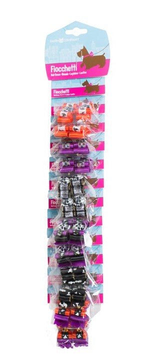 Farm Company cat accessories with colorful skull hair bows on display card, includes 12 pairs of assorted colors for feline fashion.