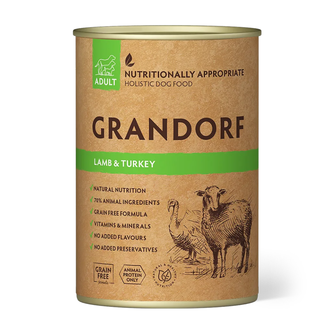 Cans of Grandorf Lamb & Turkey adult dog food with 400g label, showing wet dog food in the image.