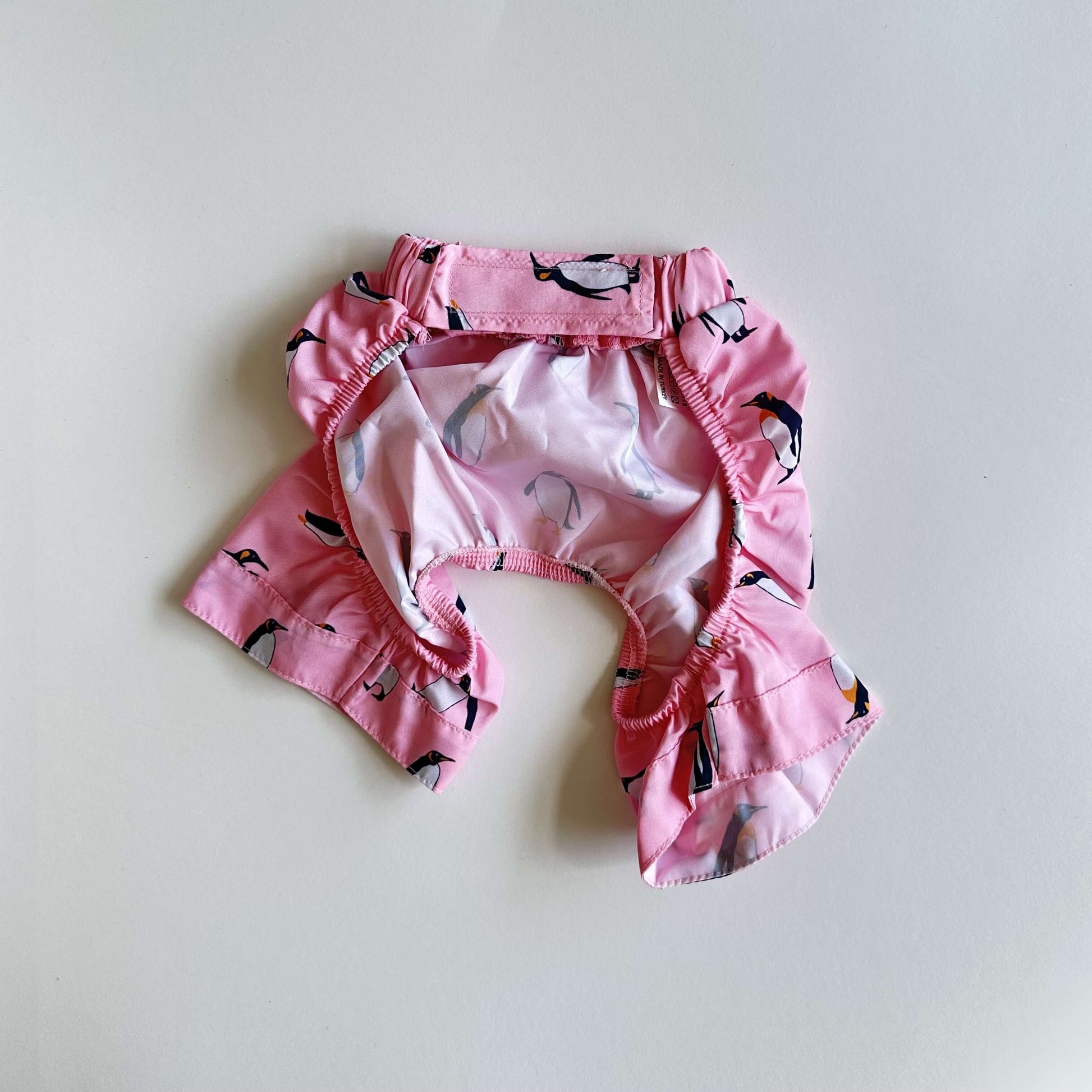 Ziggy Dog Swim Short Pink Penguin M - ملابس للحيوانات الأليفة - Zue For Pet Supplies Co.